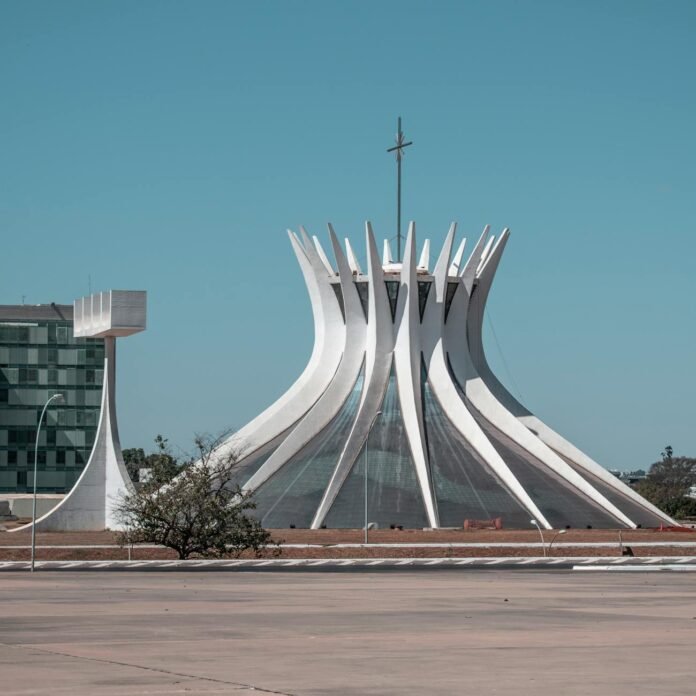 white concrete building under the blue sky