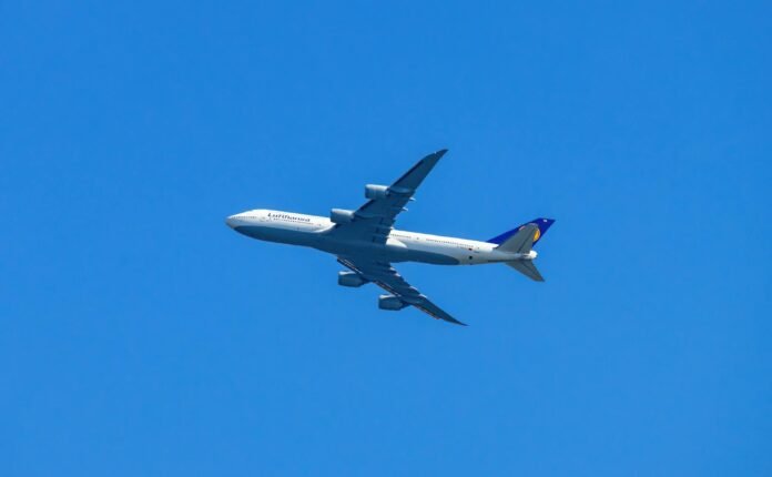 an airplane in the blue sky