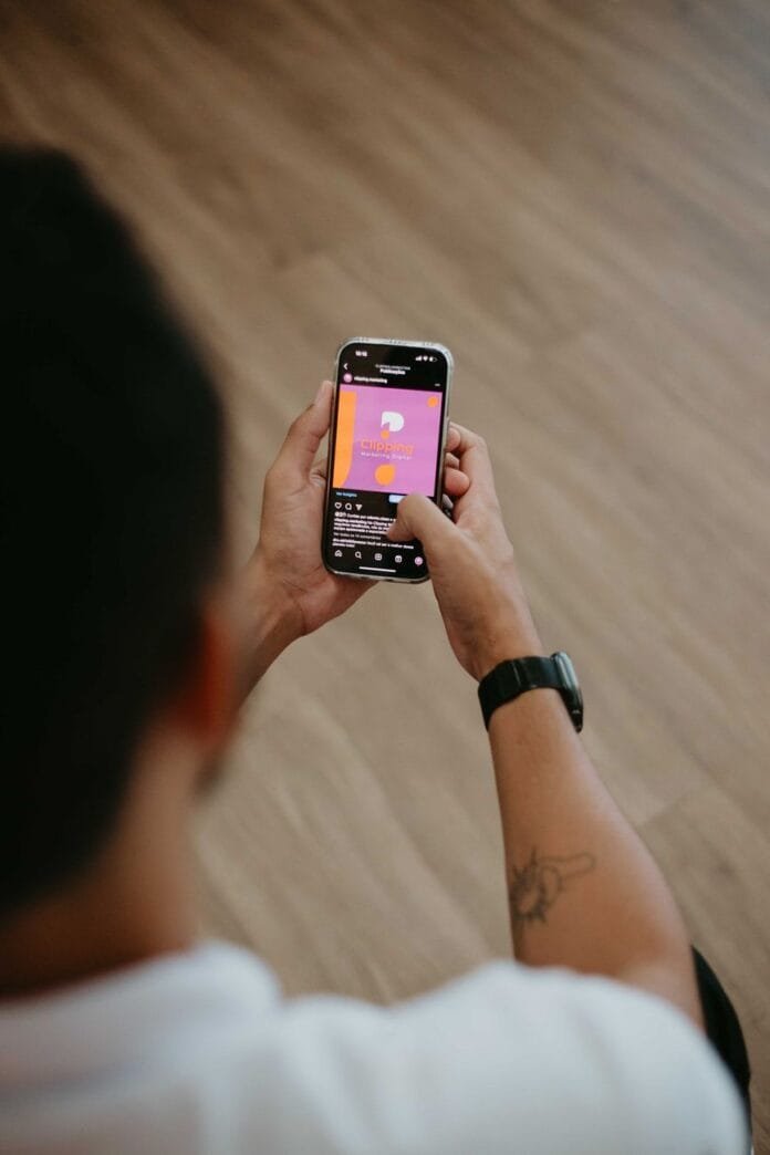 person browsing smartphone in indoor setting
