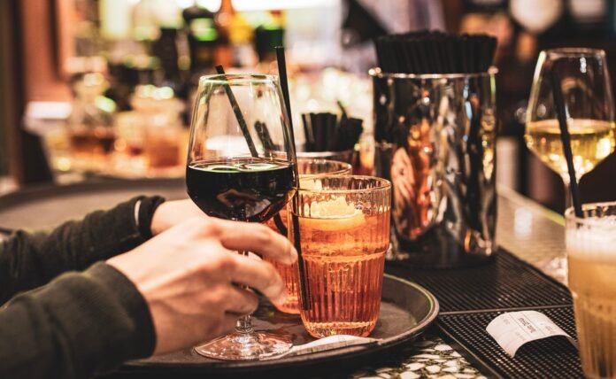 cozy bar scene in milan with drinks
